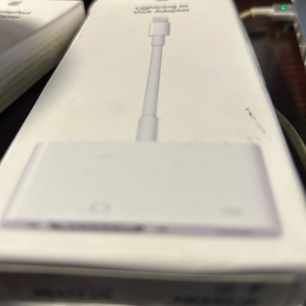 The lightening to VGA Adapter by Apple!